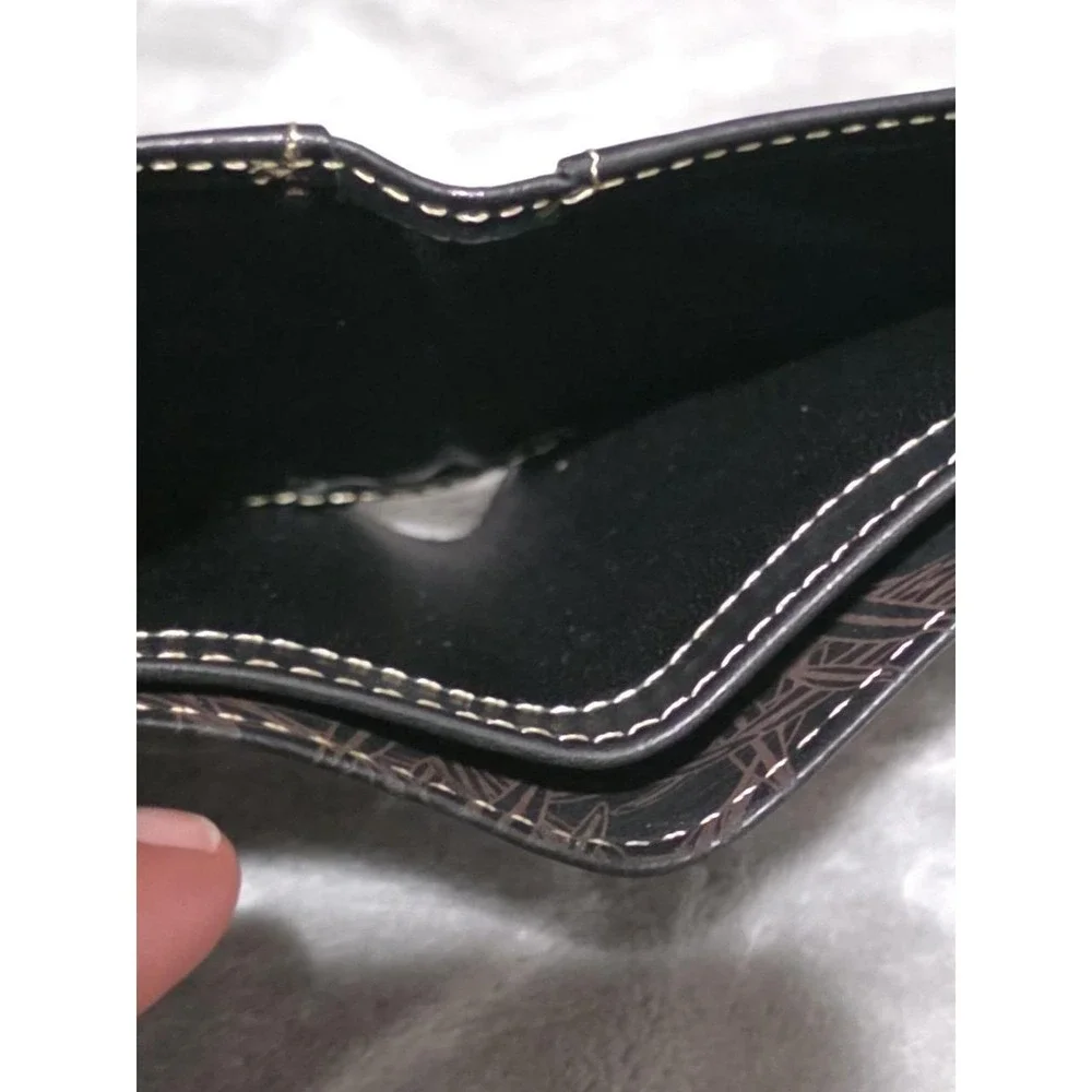 Cole Haan Black Bifold Men's Wallet with Emblem Logo and Outside Design